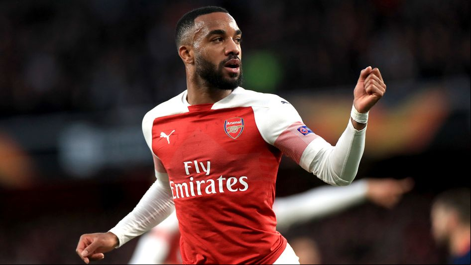 Lacazette celebrates against Valencia