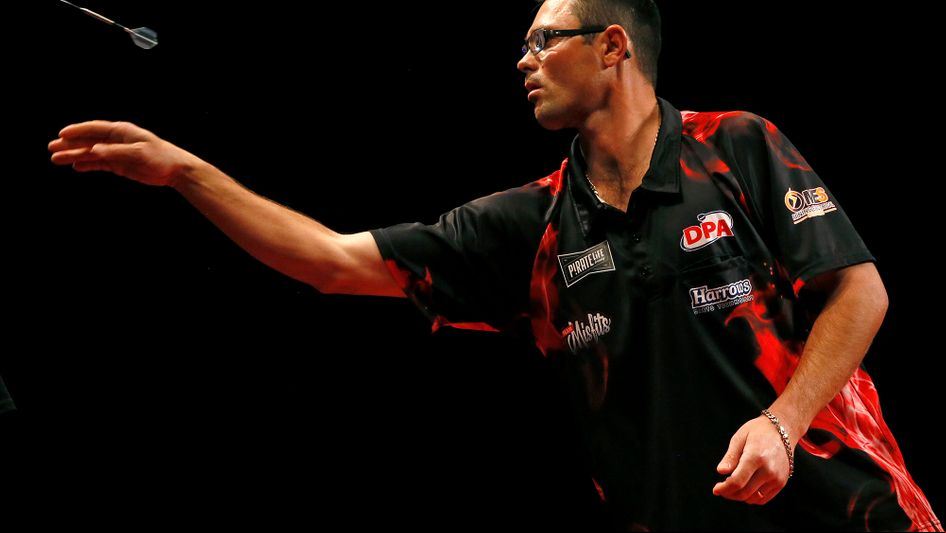 Australian darts player Damon Heta in action (credit PDC/DPA)