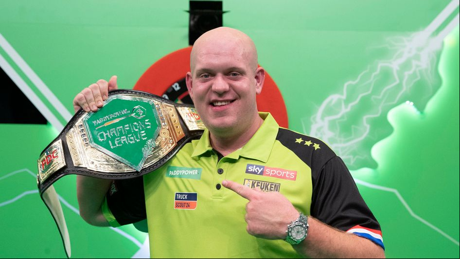 Michael van Gerwen holds the Champions League of Darts belt (Picture: Lawrence Lustig/PDC)