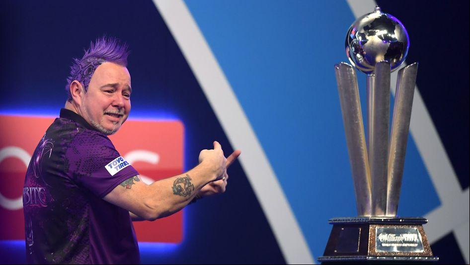 Peter Wright celebrates becoming world champion with his family