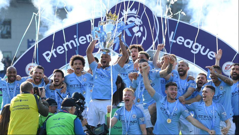 Vincent Kompany and Manchester City lift the 2018/19 Premier League trophy