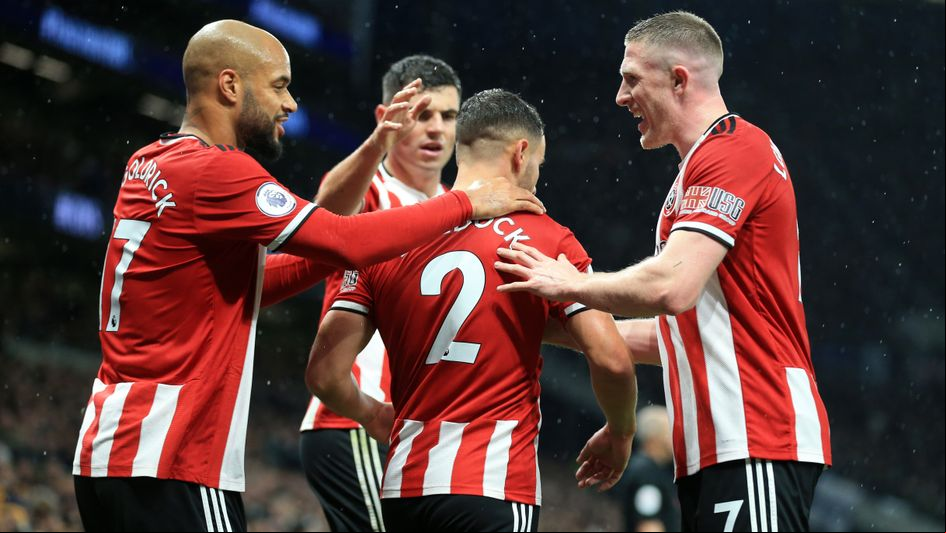 Sheffield United celebrate George Baldock's goal at Tottenham