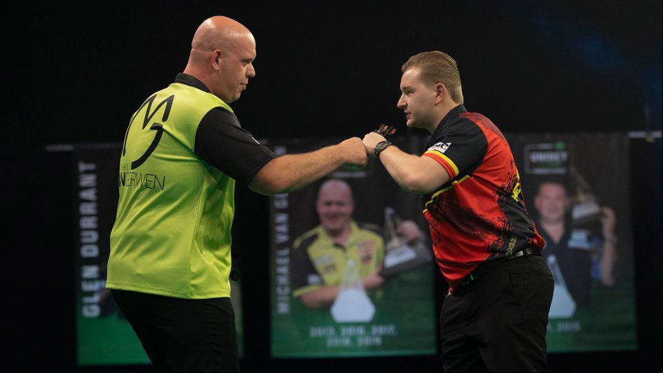 Michael van Gerwen and Dimitri Van den Bergh (Picture: Lawrence Lustig/PDC)