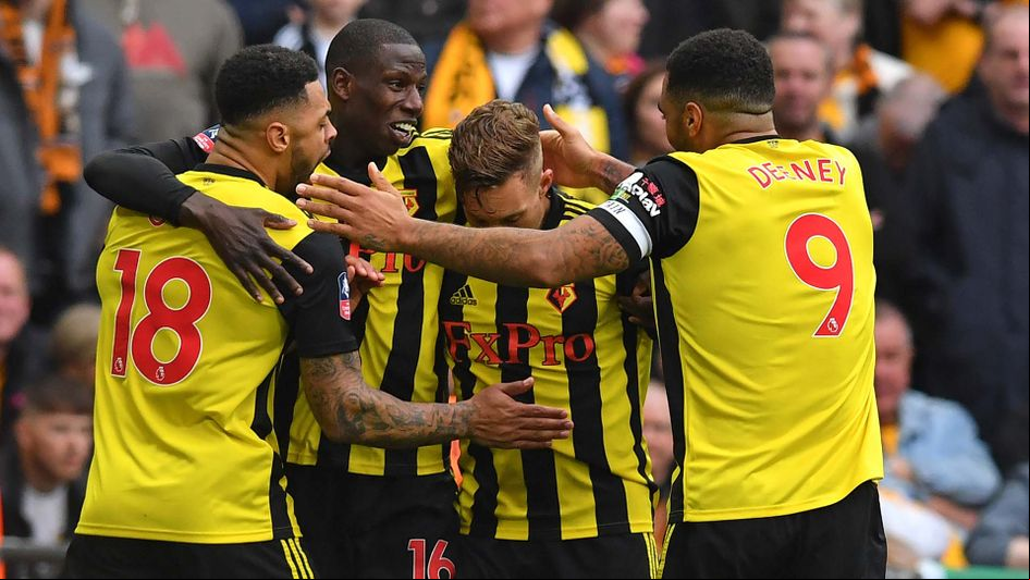 Watford players celebrate winning at Wembley